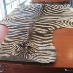 “Box 166.2/- : Zebra Skin, (1 item), Stored in oversize; box on order.”