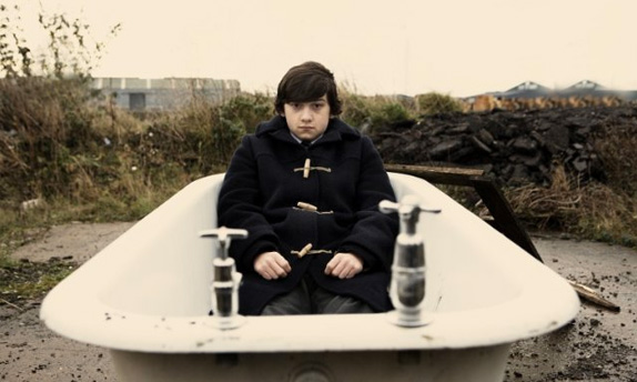 Craig Roberts as Oliver Tate.