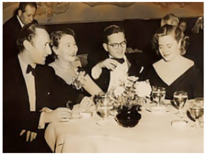 Sonia Orwell dining with (left to right) John Halas, Joy Batchelor and Bordon Mace, president of the company which produced the 1954 educational film, "Ani-mal Farm."