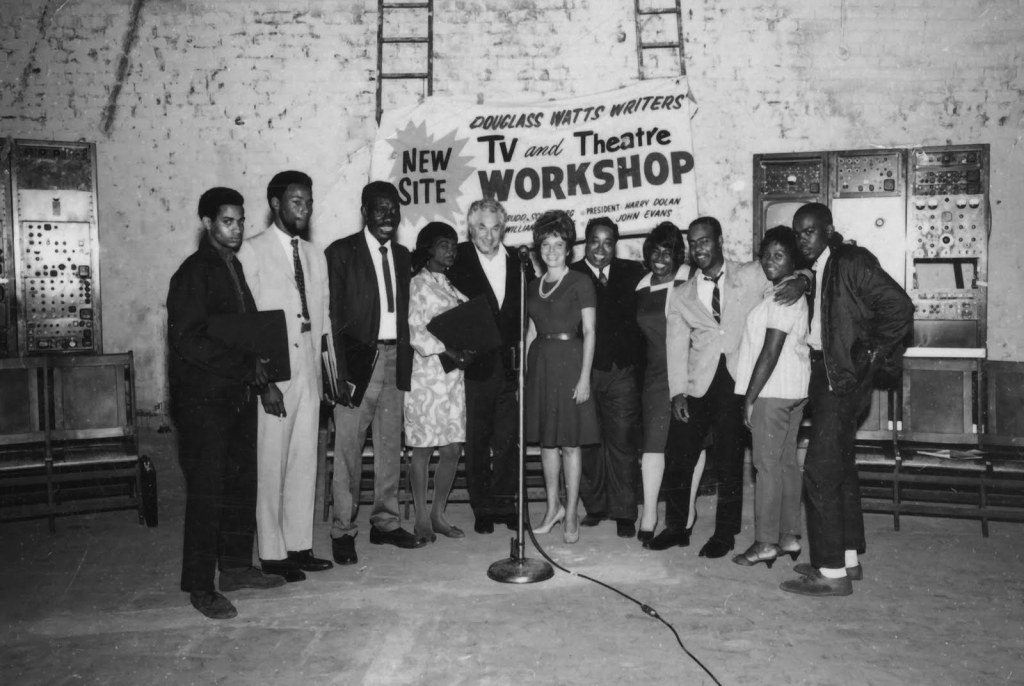 Budd Schulberg (center) at the Watts Writers’ Workshop, ca. 1965.