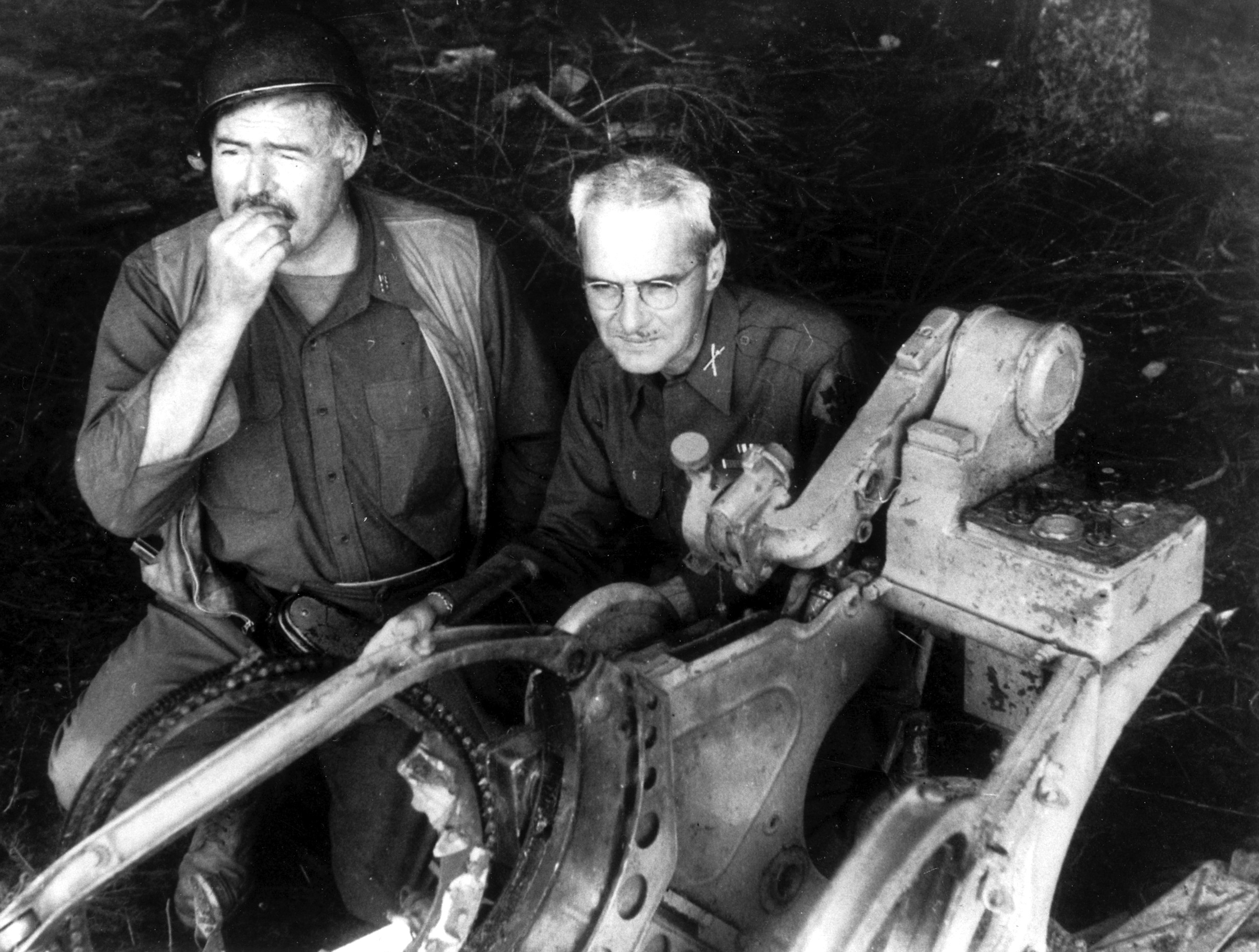 Ernest_Hemingway_with_Colonel_Charles_T._(Buck)_Lanham_September_18,_1944_-_NARA_-_192699