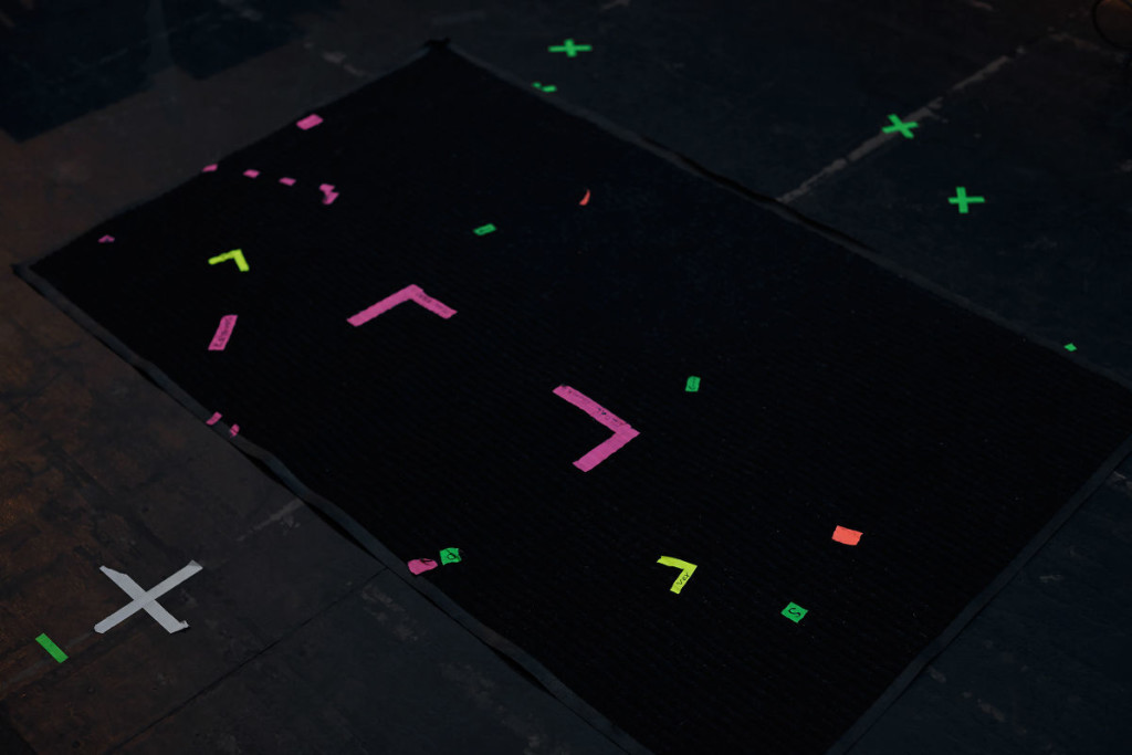 Tape markings on the stage of the Tennessee Theater indicating equipment placement for tUnEyArDs's set at the Big Ears Music Festival in 2015. Photo: Kate Joyce